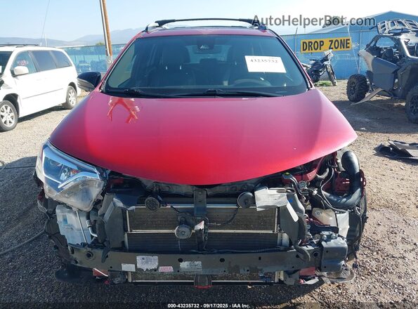 JTMJJREV2JD237089 2018 TOYOTA RAV4 HYBRID Red Widok wnętrza z tyłu