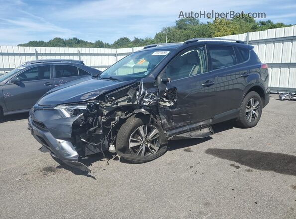 JTMRFREV6JD253025 2018 TOYOTA RAV4 Gray Առջևի ձախ երեք քառորդ տեսարան