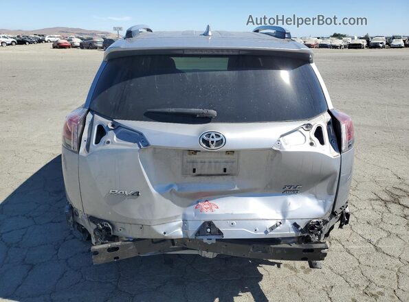 JTMRFREV8JJ258616 2018 TOYOTA RAV4 Gray Widok z tyłu