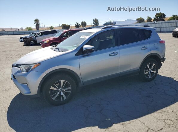 JTMRFREV8JJ258616 2018 TOYOTA RAV4 Gray Przód lewy