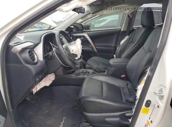 JTMWFREV7JJ187671 2018 TOYOTA RAV4 Белый Вид салона спереди