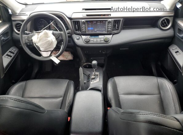 JTMWFREV7JJ187671 2018 TOYOTA RAV4 Белый Вид панели приборов