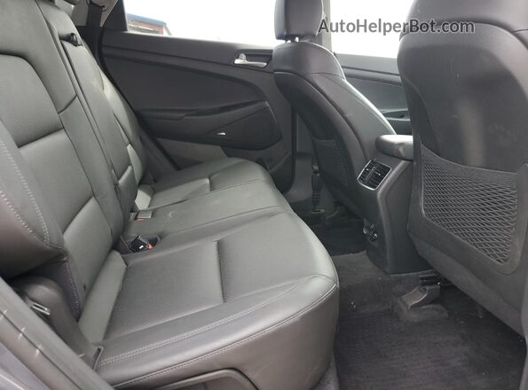 KM8J3CAL3MU410534 2021 HYUNDAI TUCSON Gray Rear interior view