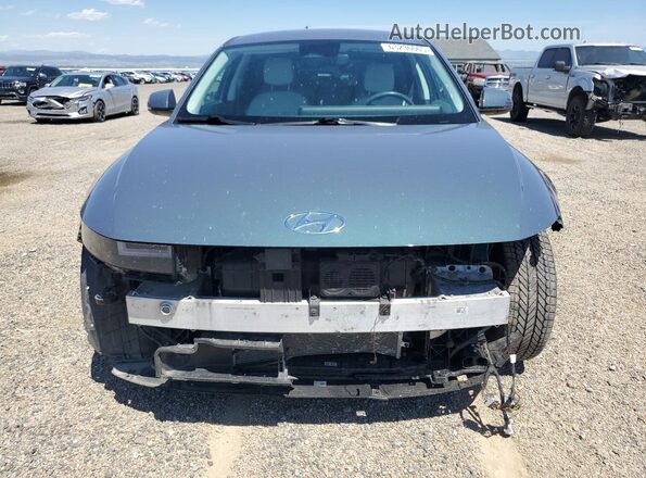 KM8KNDAF1PU201389 2023 HYUNDAI IONIQ Бирюзовый Вид спереди