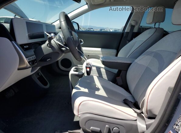 KM8KNDAF1PU201389 2023 HYUNDAI IONIQ Бирюзовый Вид салона спереди