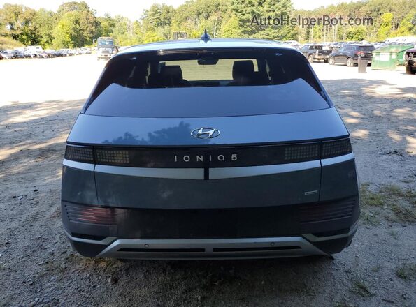 KM8KNDAF2PU207329 2023 HYUNDAI IONIQ Синий Вид сзади