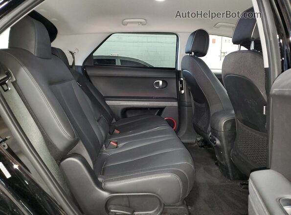 KM8KNDAF5PU203372 2023 HYUNDAI IONIQ Черный Вид задней части салона