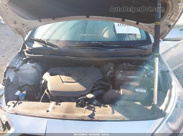 KMHCT4AEXGU142540 2016 HYUNDAI ACCENT Silver უკანა ხედი