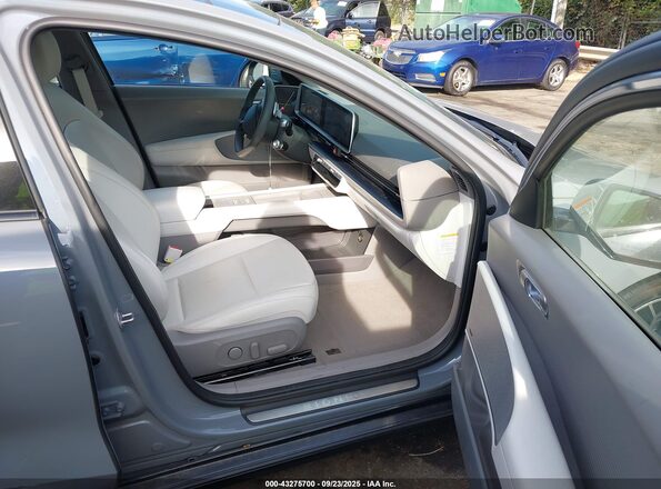 KMHM54AC5PA047303 2023 HYUNDAI IONIQ 6 Серый Вид салона спереди
