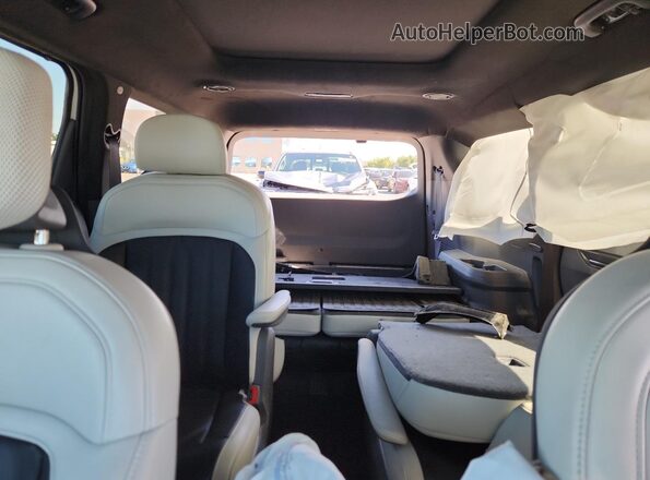 KNDAEFS54R6022658 2024 KIA EV9 White Vista de los asientos traseros