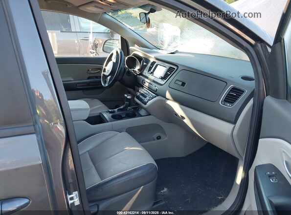 KNDMB5C15H6333090 2017 KIA SEDONA Black Widok wnętrza z przodu