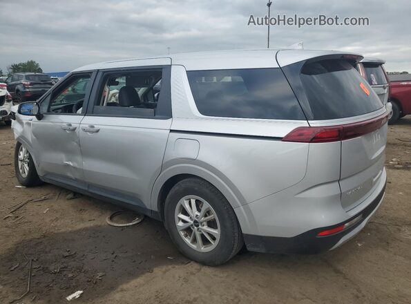 KNDNB4H36P6255362 2023 KIA CARNIVAL Silver Trasero izquierdo