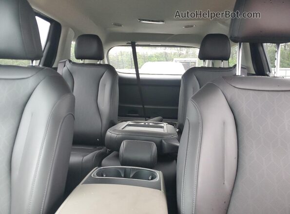 KNDNB5KA5S6050766 2025 KIA CARNIVAL Black Rear seats view