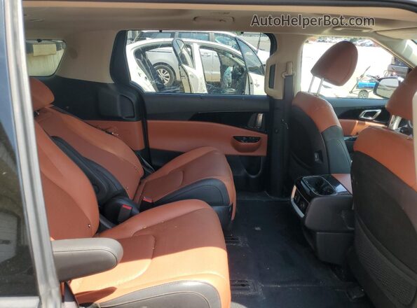 KNDNE5H37P6226790 2023 KIA CARNIVAL Синий Вид задней части салона