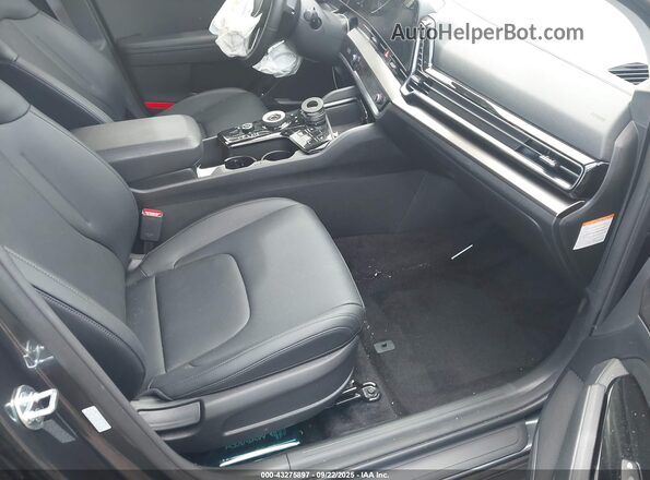 KNDPVCDG3S7243532 2025 KIA SPORTAGE HYBRID Green Widok wnętrza z przodu
