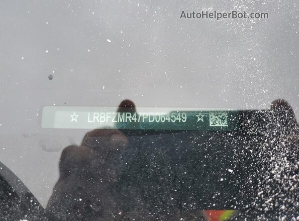 LRBFZMR47PD064549 2023 BUICK ENVISION Red Vista de la etiqueta del VIN