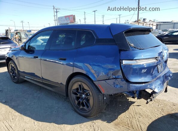 WB523CF02RCP98985 2024 BMW IX Blue Rear right