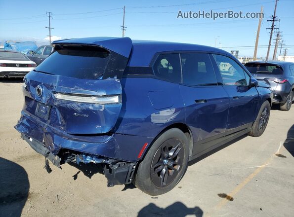 WB523CF02RCP98985 2024 BMW IX Blue Front right