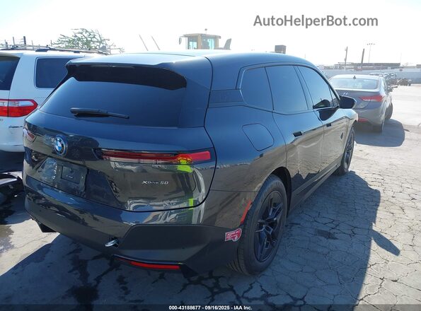 WB523CF03RCP86537 2024 BMW IX Gray Trasero derecho