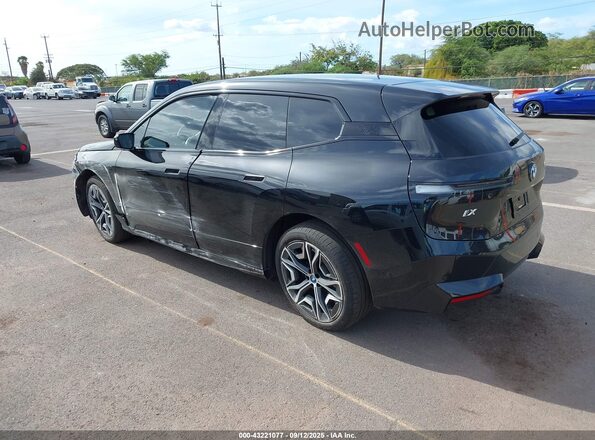 WB523CF07RCN39005 2024 BMW IX Black Trasero izquierdo