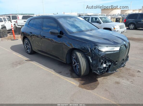 WB523CF07RCN39005 2024 BMW IX Black Delantero derecho