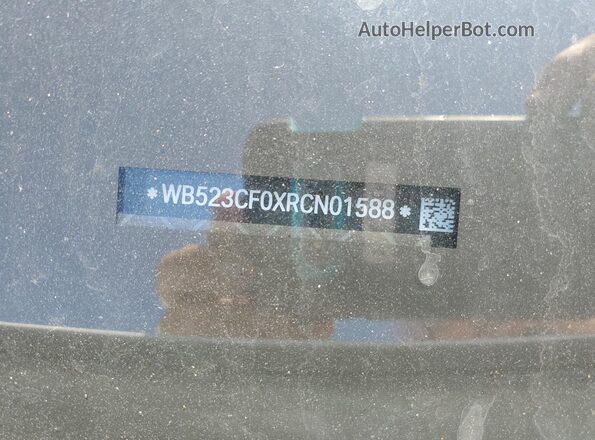 WB523CF0XRCN01588 2024 BMW IX White VIN კოდის სტიკერის ხედი