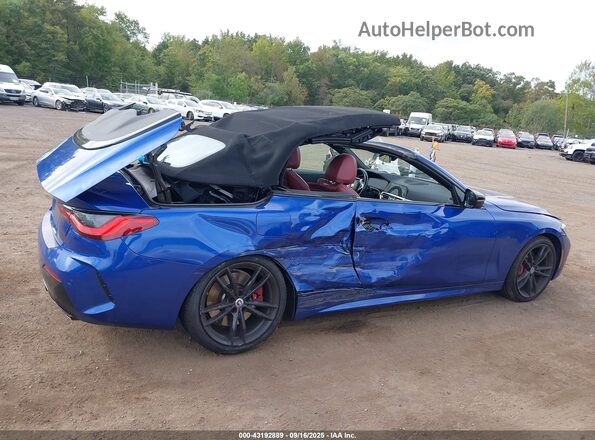 WBA63AT01PCL68034 2023 BMW M4 Blue Вид задньої частини салону