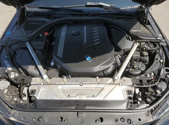 WBA63AT08PCM47961 2023 BMW M4 Black Vista interior trasera