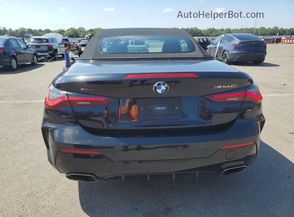 WBA63AT08PCM47961 2023 BMW M4 Black Vista trasera