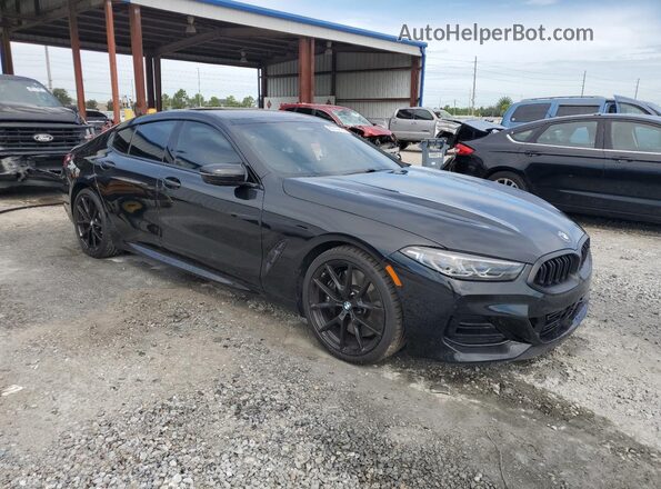 WBAGV8C02PCL57423 2023 BMW M8 Black Delantero derecho