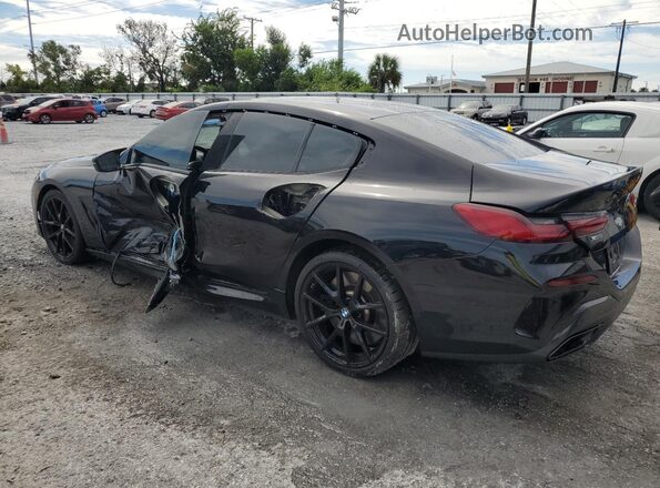 WBAGV8C02PCL57423 2023 BMW M8 Black Trasero izquierdo