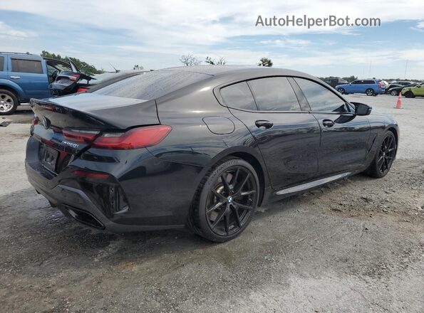 WBAGV8C02PCL57423 2023 BMW M8 Black Trasero derecho