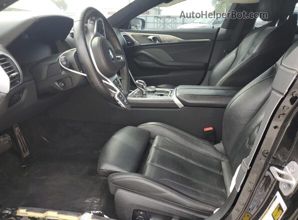 WBAGV8C02PCL57423 2023 BMW M8 Black Vista interior delantera