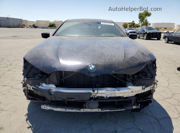 WBAGV8C06NCJ92778 2022 BMW M8 Blue Front view