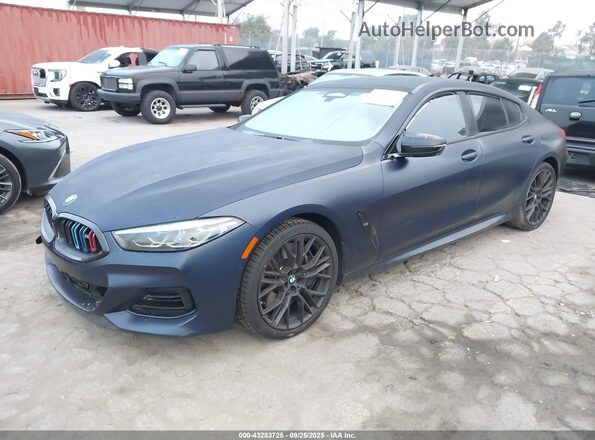 WBAGV8C07PCK50254 2023 BMW M8 Черный Передняя левая четверть