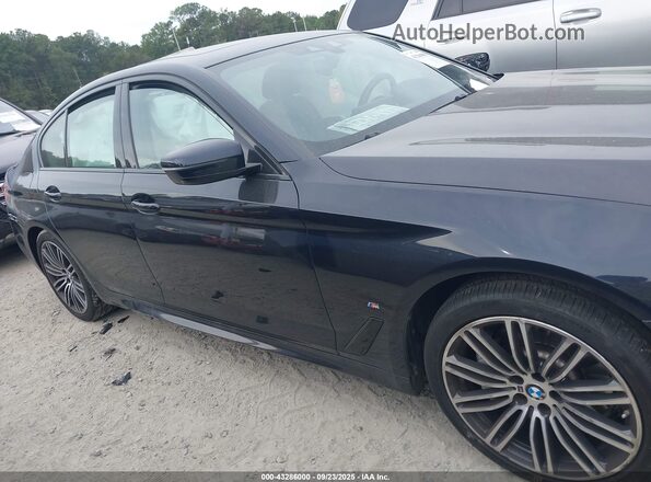 WBAJA9C07LCD45451 2020 BMW 5 SERIES Black Вид задньої частини салону