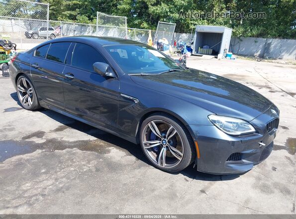 WBS6E9C59GGF92518 2016 BMW M6 Серый Передняя правая четверть