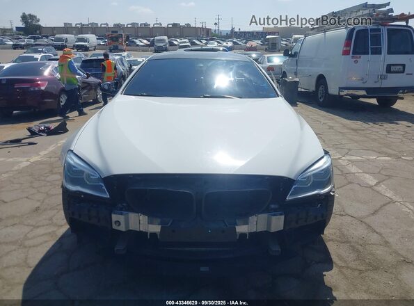 WBS6E9C5XGGF92639 2016 BMW M6 Белый Вид задней части салона