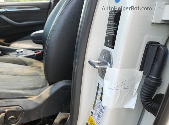 WBXHT3C30J5K28797 2018 BMW X1 White VIN კოდის სტიკერის ხედი
