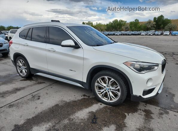 WBXHT3C36G5E47257 2016 BMW X1 Белый Передняя правая четверть