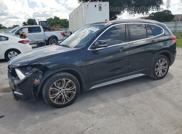 WBXHT3C39J5L29403 2018 BMW X1 Black წინა მარცხენა ხედი სამი მეოთხედიდან