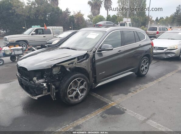 WBXHT3Z32H4A54029 2017 BMW X1 Серый Передняя левая четверть