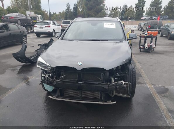 WBXHT3Z32H4A54029 2017 BMW X1 Серый Вид задней части салона
