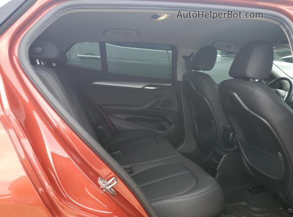 WBXYH9C07P5W57373 2023 BMW X2 Burgundy Rear interior view