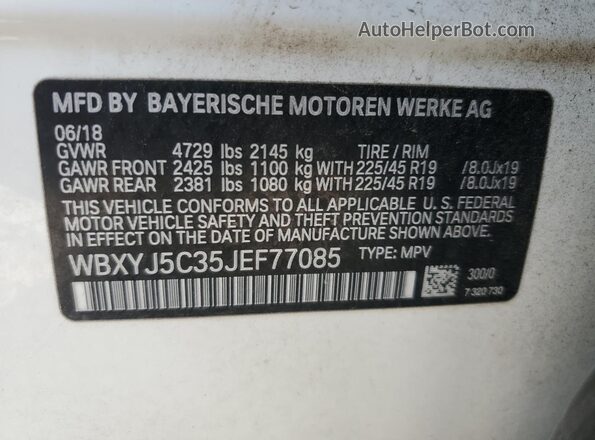 WBXYJ5C35JEF77085 2018 BMW X2 White VIN sticker view