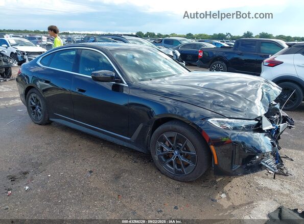 WBY43AW03RFT30343 2024 BMW I4 Черный Передняя правая четверть
