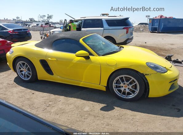 WP0CA2A8XMS210397 2021 PORSCHE 718 BOXSTER Желтый Вид задней части салона