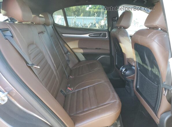 ZASFAKNN2J7C01955 2018 ALFA ROMEO STELVIO Gray Rear interior view