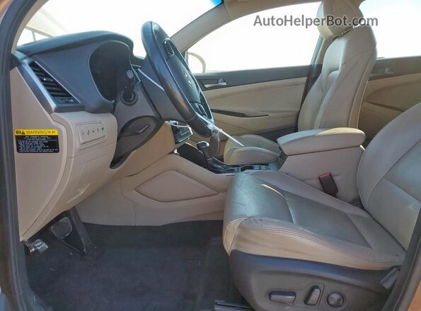 KM8J3CA27GU029538 2016 HYUNDAI TUCSON Коричневый Вид панели приборов