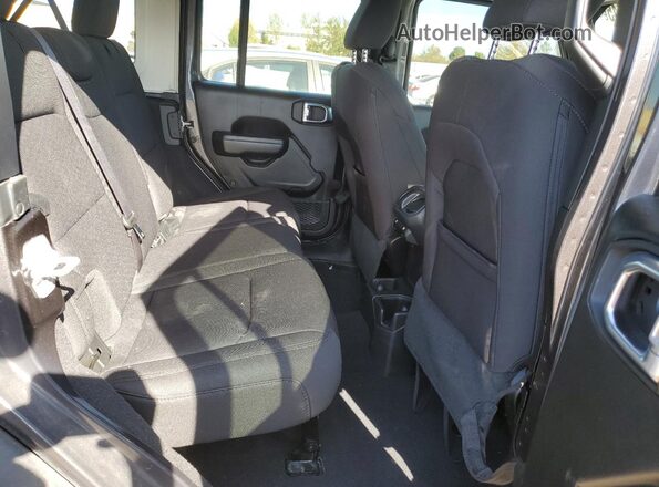 1C4HJXDG5PW595113 2023 JEEP WRANGLER Gray Widok wnętrza z tyłu